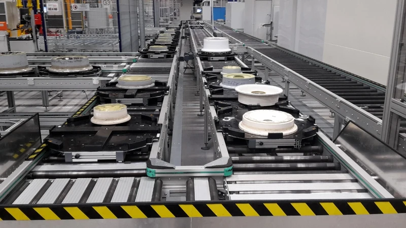 Sistema automatizado de transporte de componentes de ruedas y frenos de avión creado por MiniTec para Lufthansa Technik.
